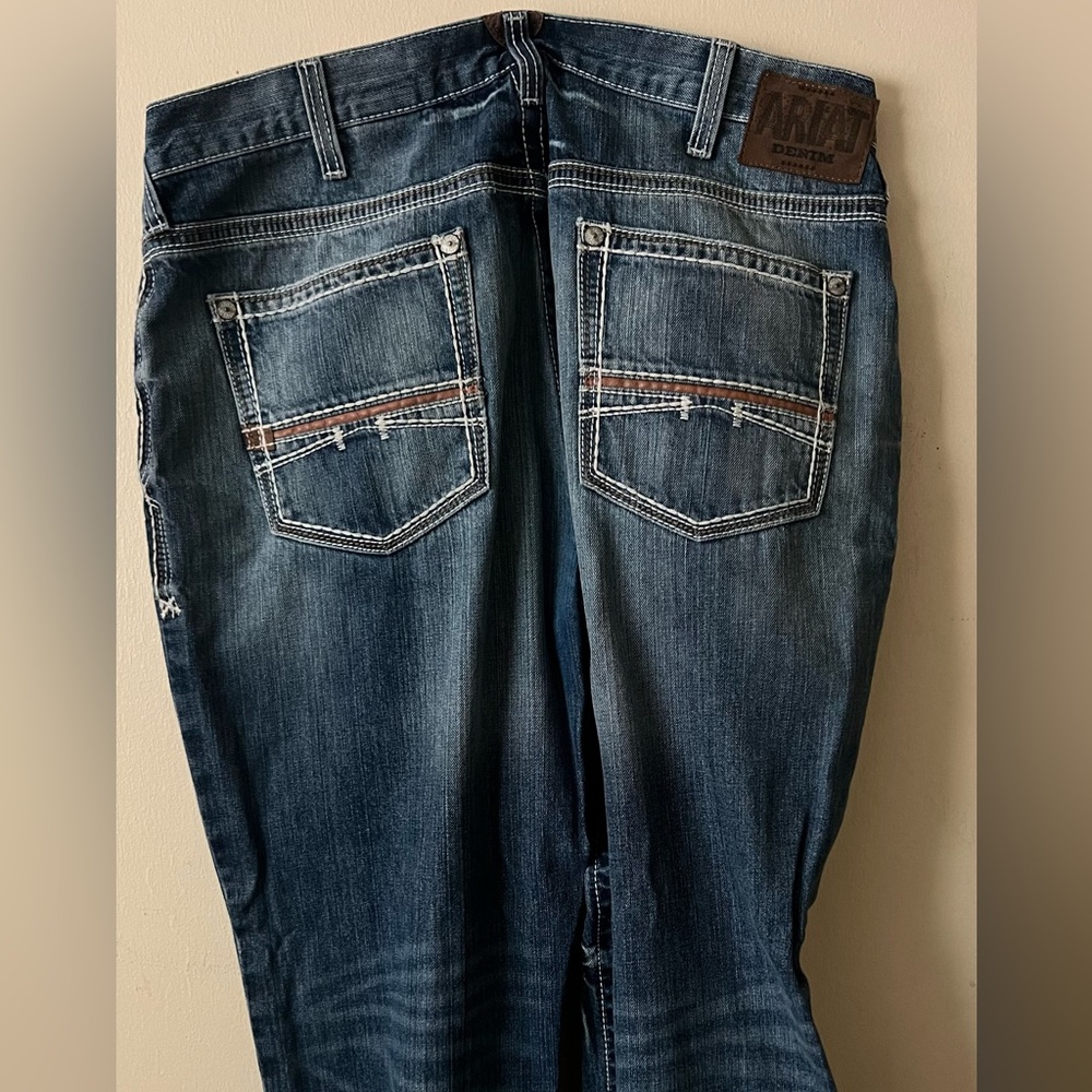 Ariat low rise boot cut jeans.
